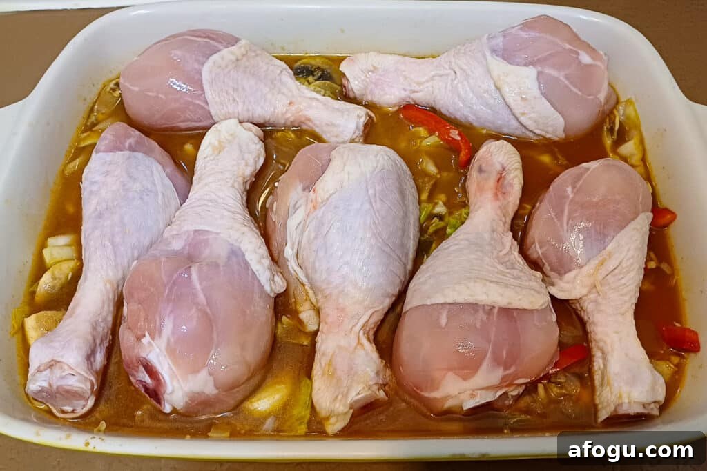 paprika chicken on rice before cooking