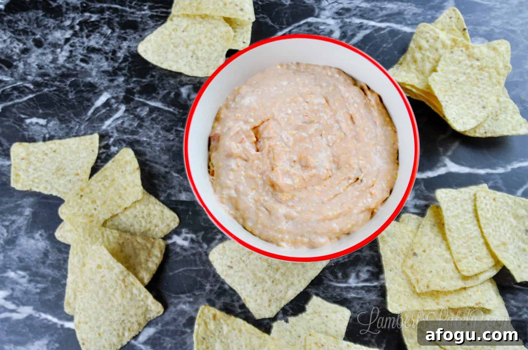 cream cheese and salsa dip with chips.
