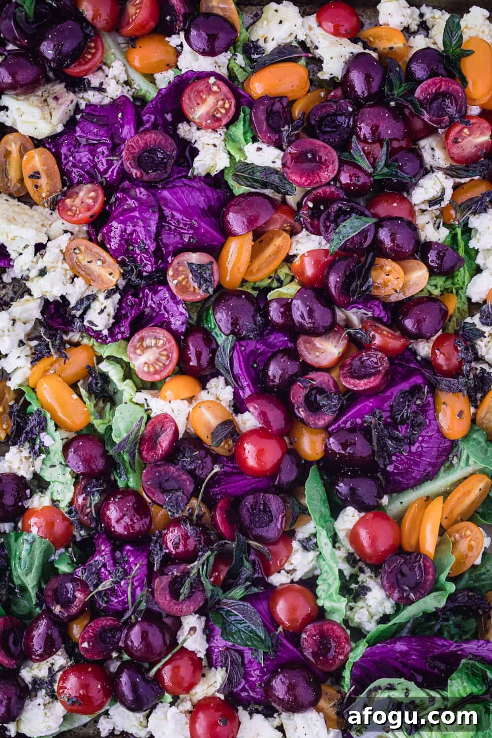 Summer Salad Recipe That Keeps Giving All Season Long 12 Cherry & Cherry Tomato Summer Salad with purple cabbage, greens and baked feta.