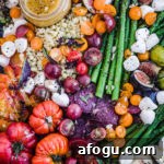 Summer Salad Recipe That Keeps Giving All Season Long 6 Summer salad with corn, asparagus, cheese, figs, avocado, tomatoes, basil and a vinaigrette.