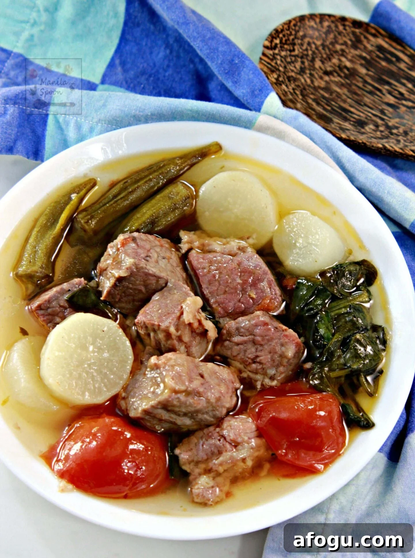 Use the slow cooker to make this Filipino favorite soup - Sinigang na Corned Beef (Corned Beef in Sour Soup). The meat comes out so tender and tasty with that unmistakable tangy and zesty flavor! Serve with rice!