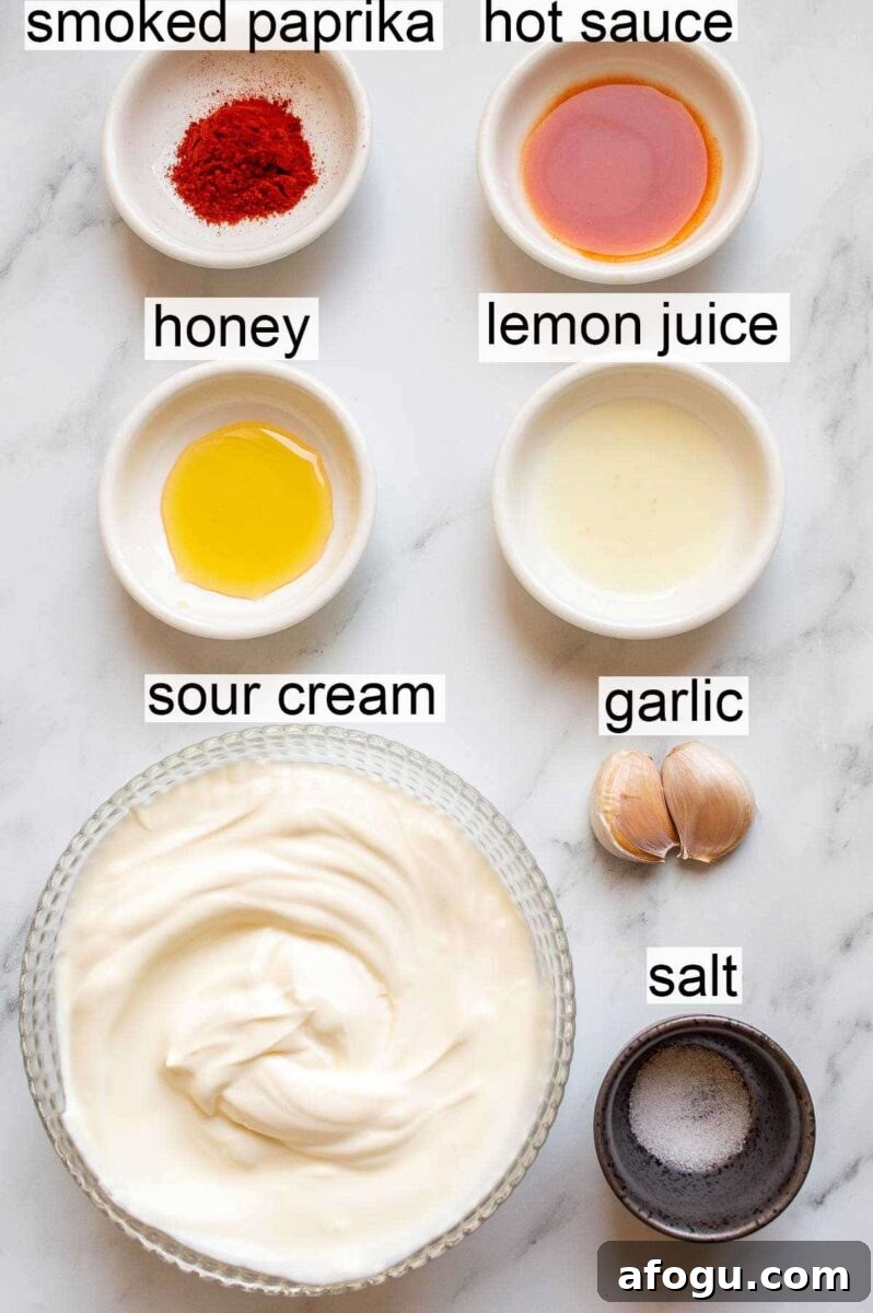 Labelled ingredients including smoked paprika, hot sauce, honey, lemon juice, sour cream, garlic and salt.