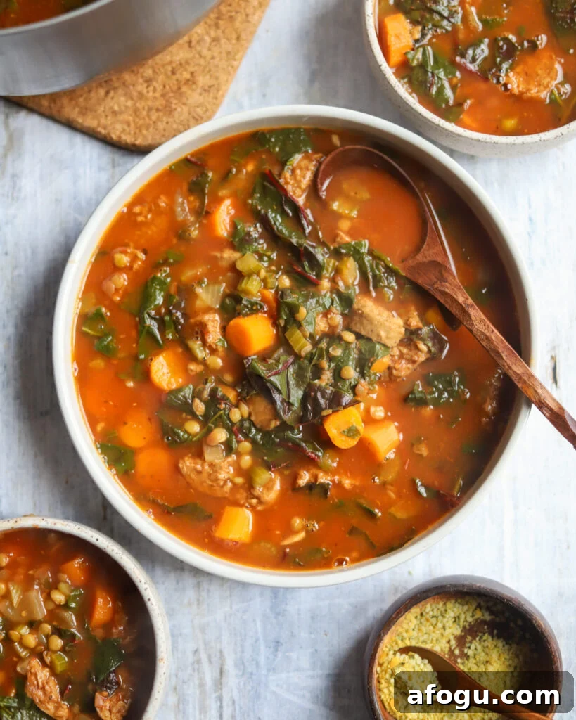 Overhead shot of a big bowl of Vegan Lentil and Sausage Soup