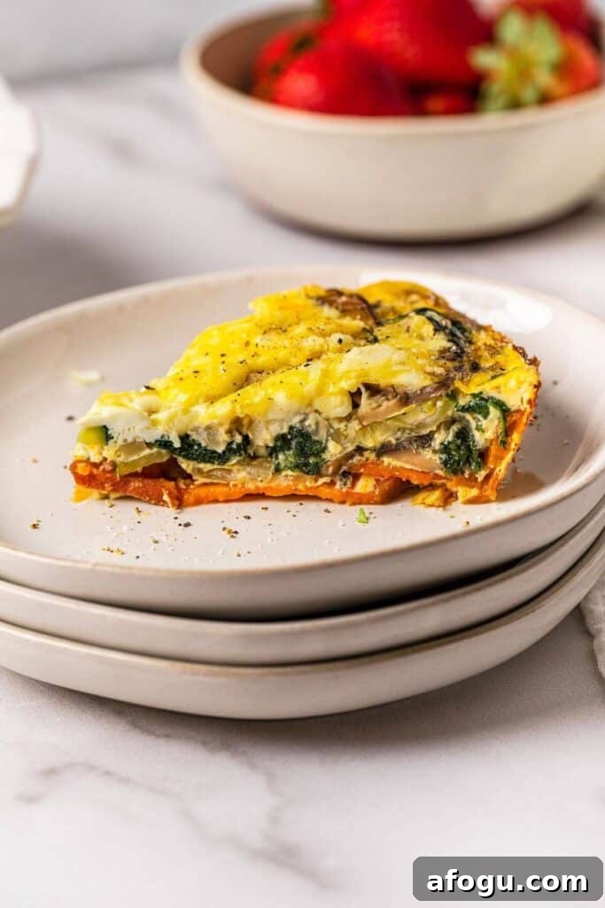 slice of gluten free quiche with a sweet potato crust