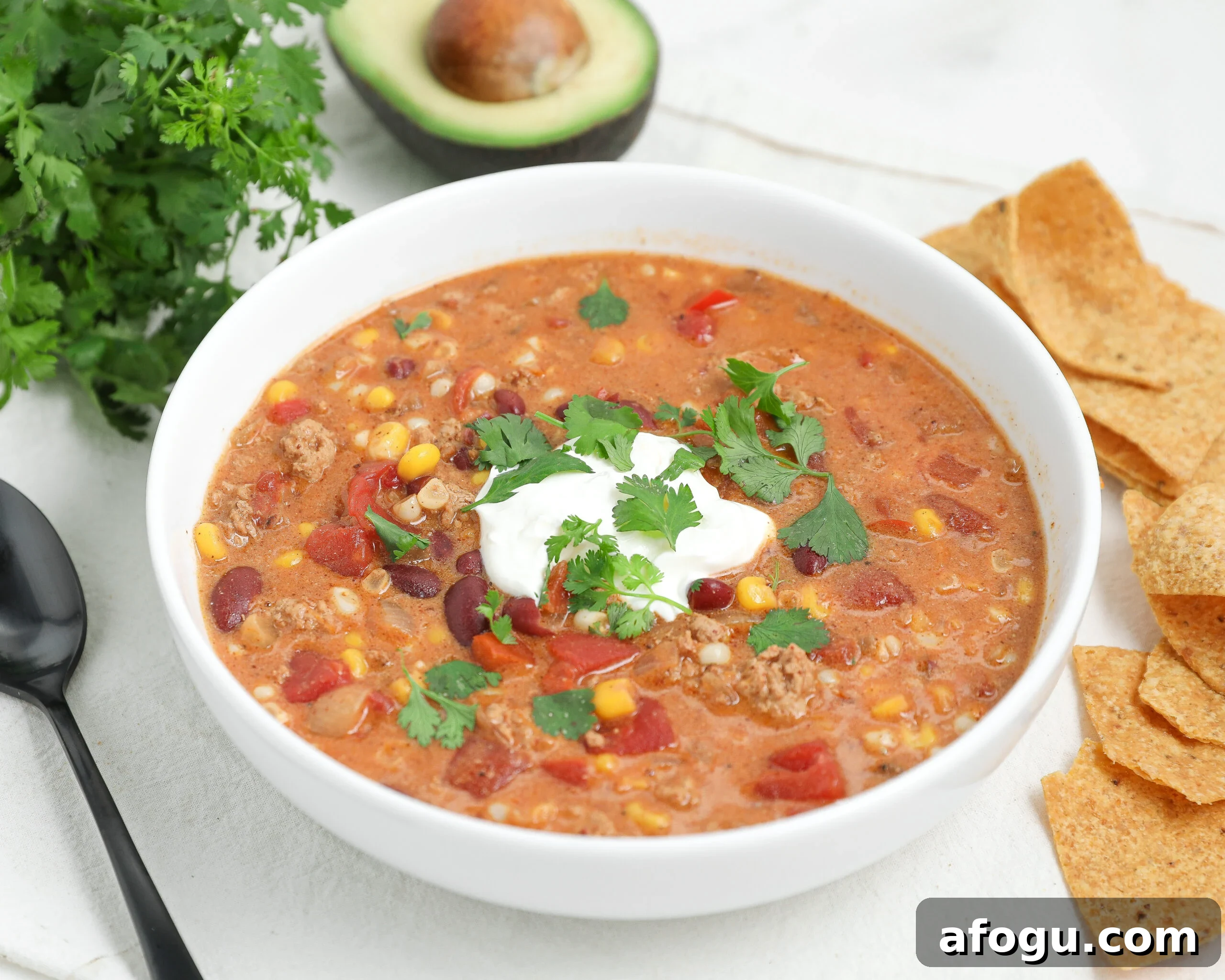 Mexican Street Corn Chicken Chili is a creamy one-pot chili made with ground chicken, corn, tomatoes, sour cream, and bold spices.