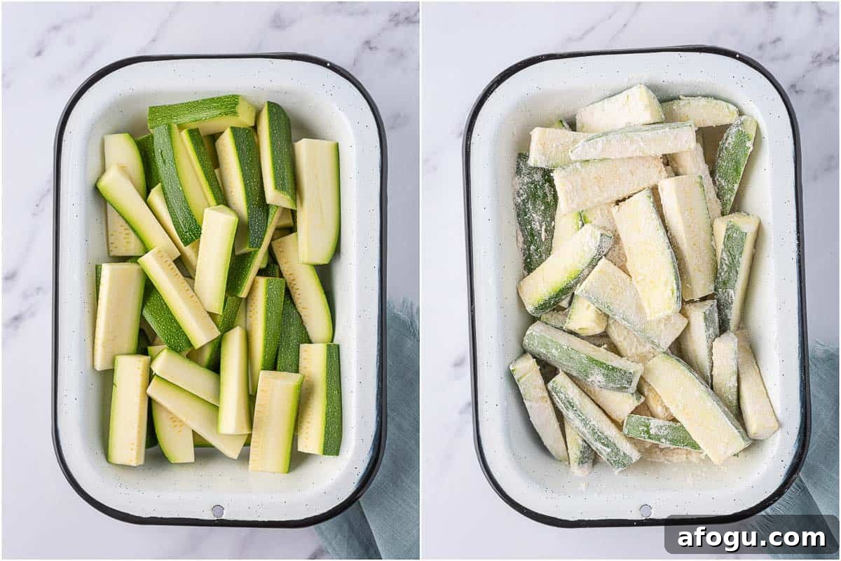 Coating fresh zucchini fries with flour.