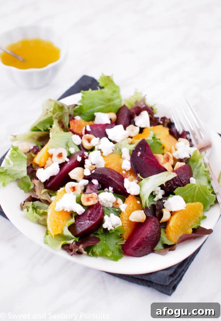 Plate of Roasted Beet and Orange Salad served with Citrus Vinaigrette.