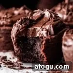 frosted brownie cupcakes on cake plate (7)