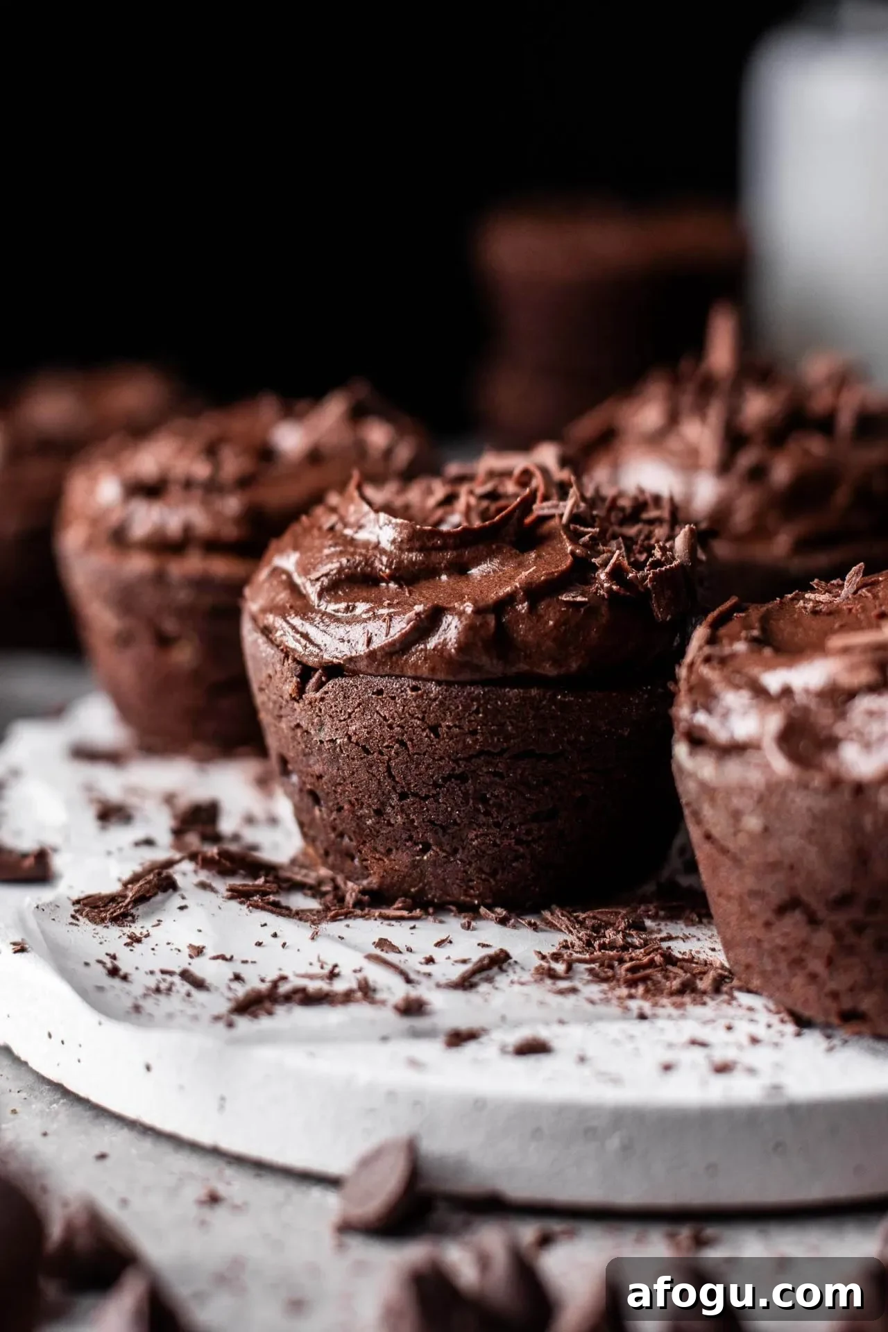 frosted brownie cupcakes on cake plate