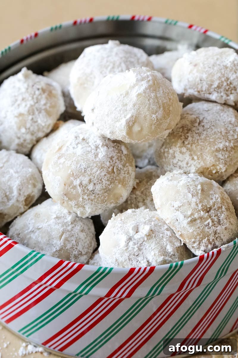 snowball-cookies in a holiday tin 