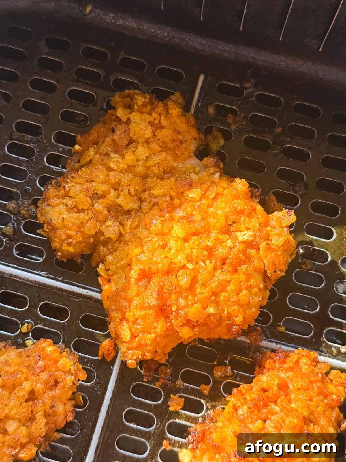 nashville fried chicken placed in the air fryer and ready to be cooked